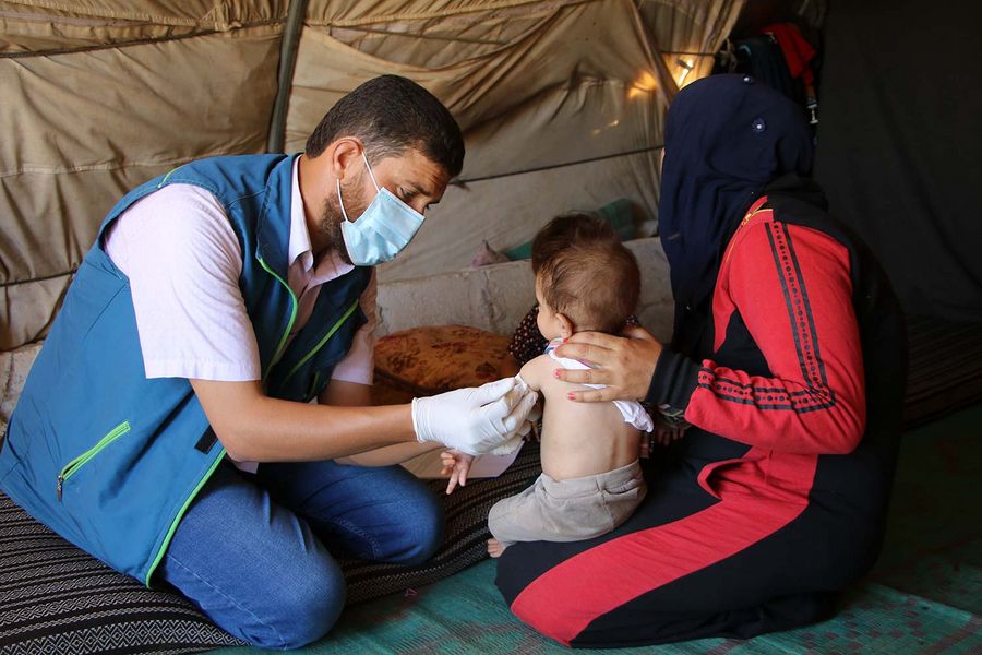 Medical check-up of a small child in Syria