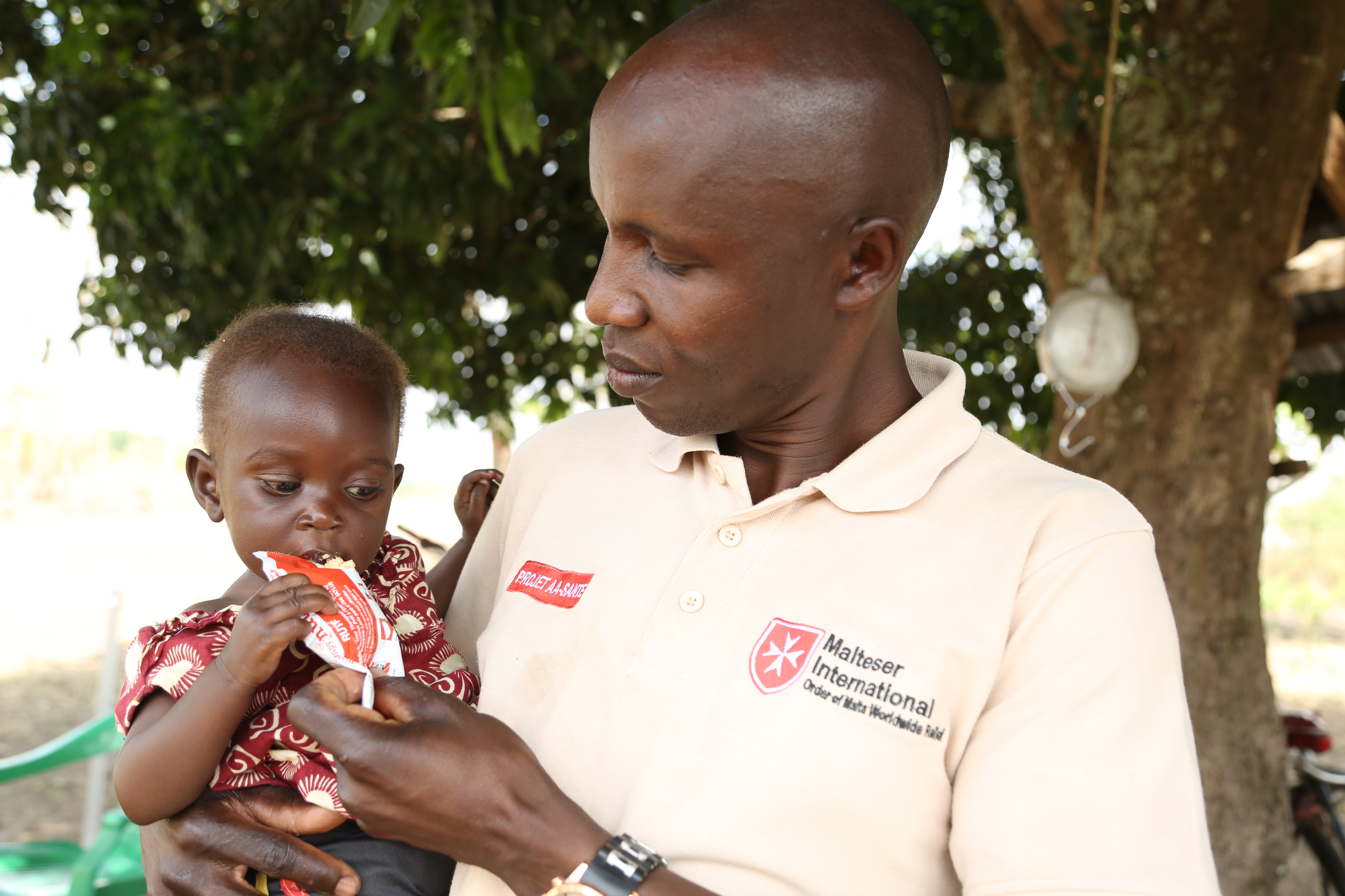 Les conséquences de la pandémie COVID-19 - le chômage et la hausse des prix des denrées alimentaires - ont provoqué la famine chez des millions de personnes. Photo : Nyokabi Kahura/Malteser International. 